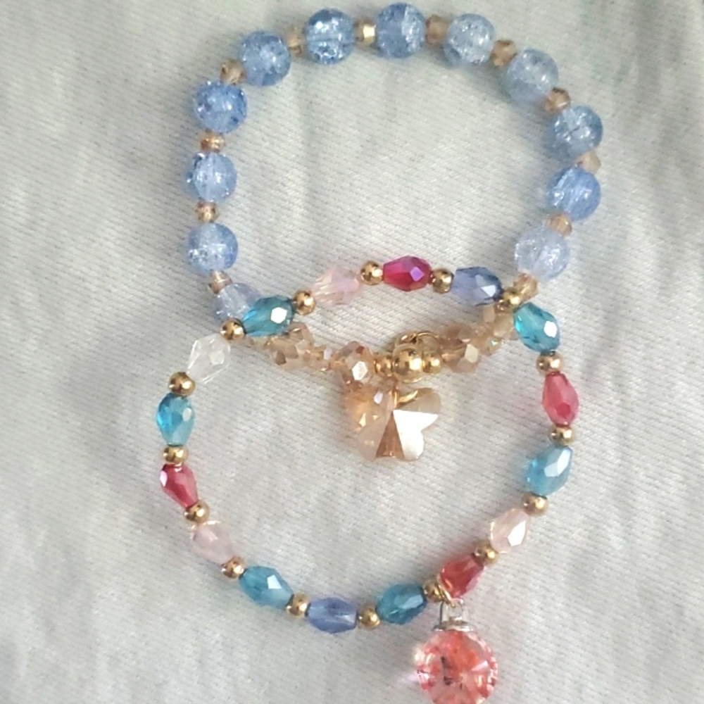 Bracelets (2) 1 Blue And Gold/ 1 Red Blue And Gold
